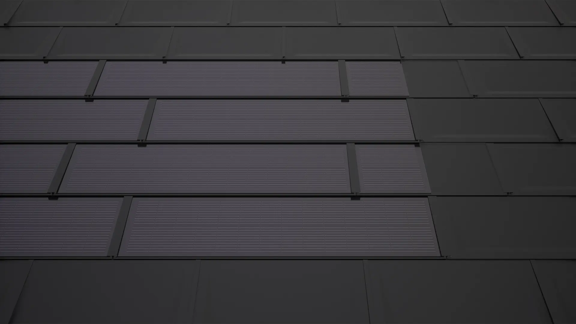 PREFA solar-dakpannen in zwart met aanvullende platen. Deze zorgen voor een rechthoekig moduleoppervlak en dragen bij aan een harmonieus totaalbeeld op het solar-dakpan.
